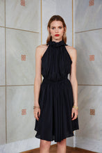 Load image into Gallery viewer, Blonde model wearing sleeveless silk top Nyx in black color front view