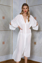 Load image into Gallery viewer, Blonde beauty wearing pure silk kaftan dress Onassis in white color front view
