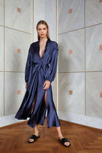 Load and play video in Gallery viewer, Blonde model wearing pure silk kaftan dress in night blue Zorba