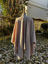Load image into Gallery viewer, cashmere cape cream beige color in an beautiful garden
